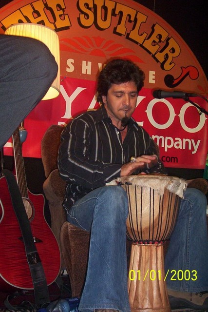 Terry Ilous on the bongo drum